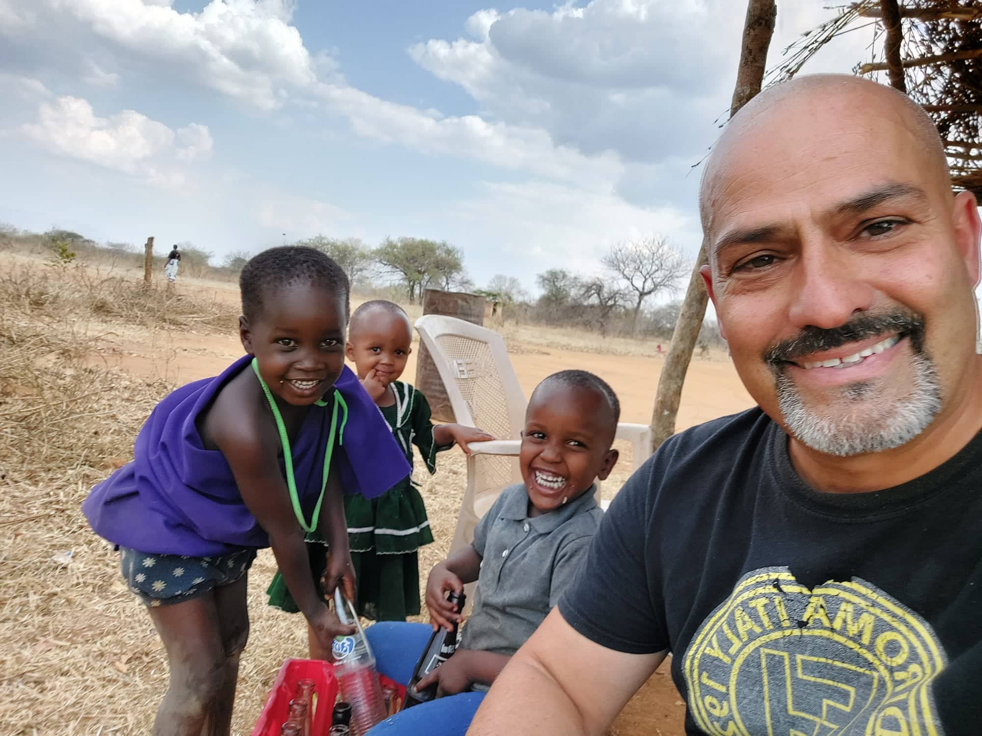 Neil with Masai kids